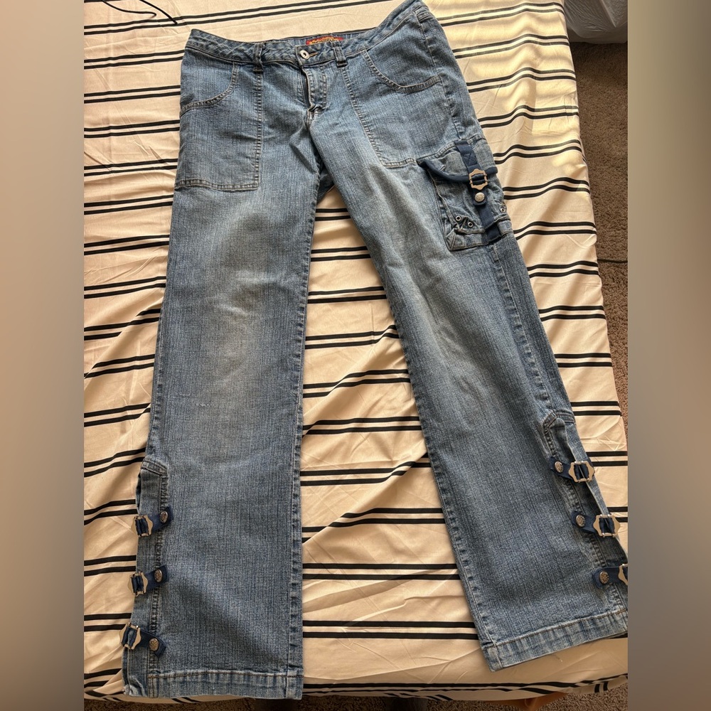 Unisex denim with buckle latches on the bottoms